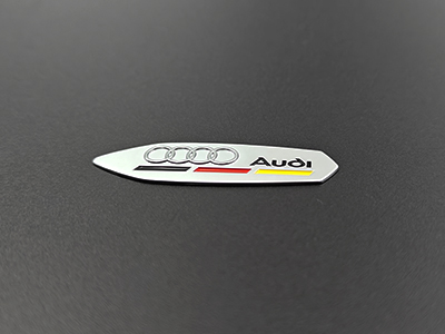 Automotive-specific nickel logo